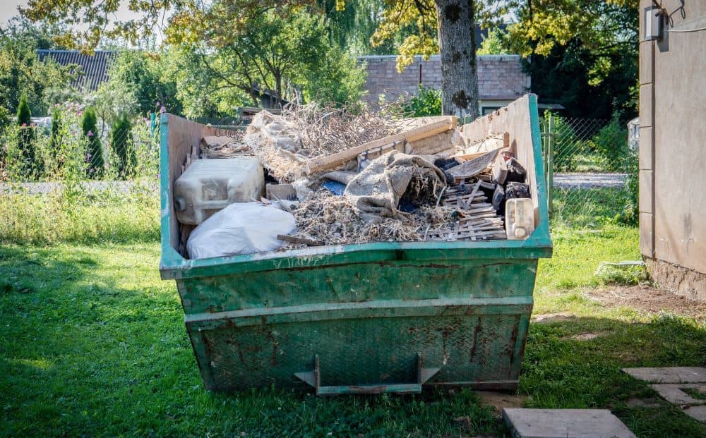 Skip bin filled with construction debris.