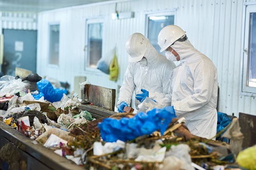 Rubbish Sorting At Waste Processing Plant