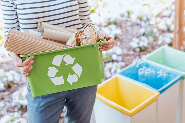 lady with recycling bin