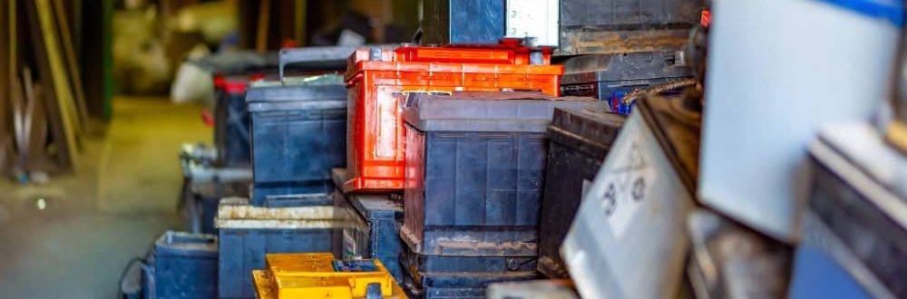 Discarded car batteries ready to be recycled.