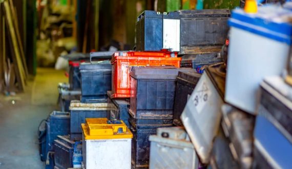 Discarded car batteries ready to be recycled.